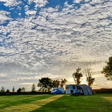 Two motorhomes under a mackeral sky near Thirsk on the North Yorks Moor